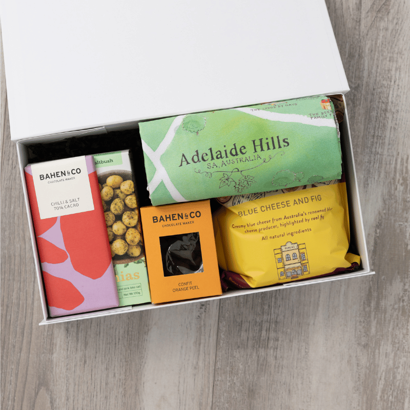Gourmet popcorn, artisanal chocolate, hand-roasted macadamias, plus a watercolour-illustrated map cotton tea towel of the Adelaide Hills and matching greeting card in a gift hamper with free delivery