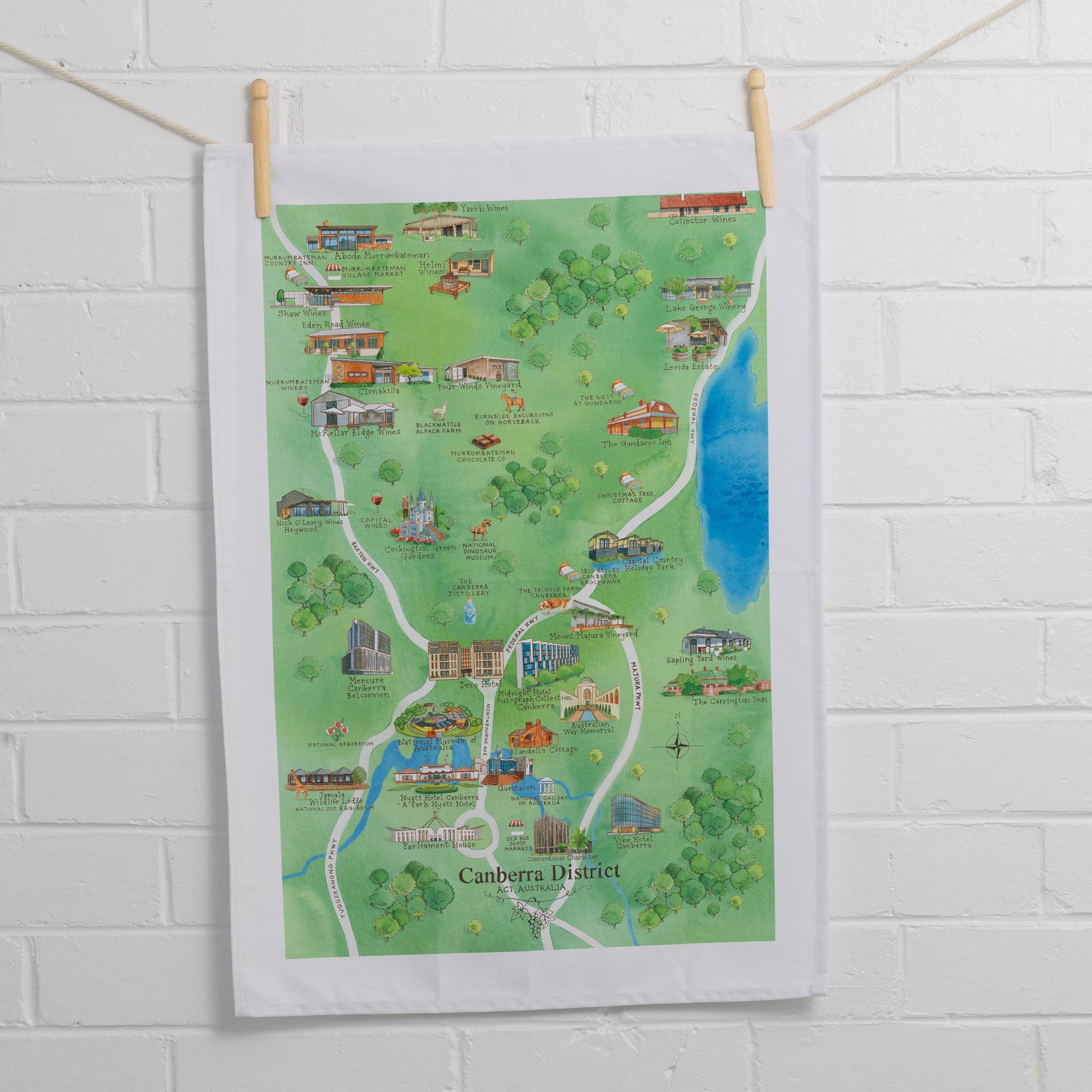 Australian Map Gifts cotton Canberra District 2.0 tea towel on wall