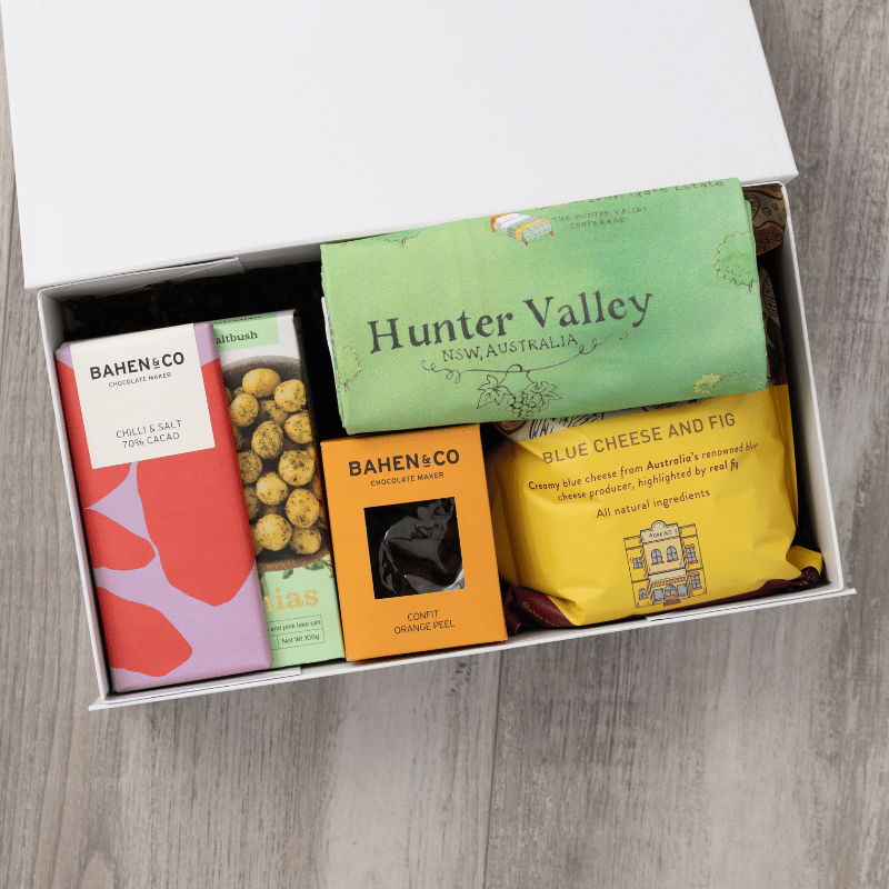 Gourmet popcorn, artisanal chocolate, hand-roasted macadamias, plus a watercolour-illustrated map cotton tea towel of the Hunter Valley and matching greeting card in a gift hamper with free delivery