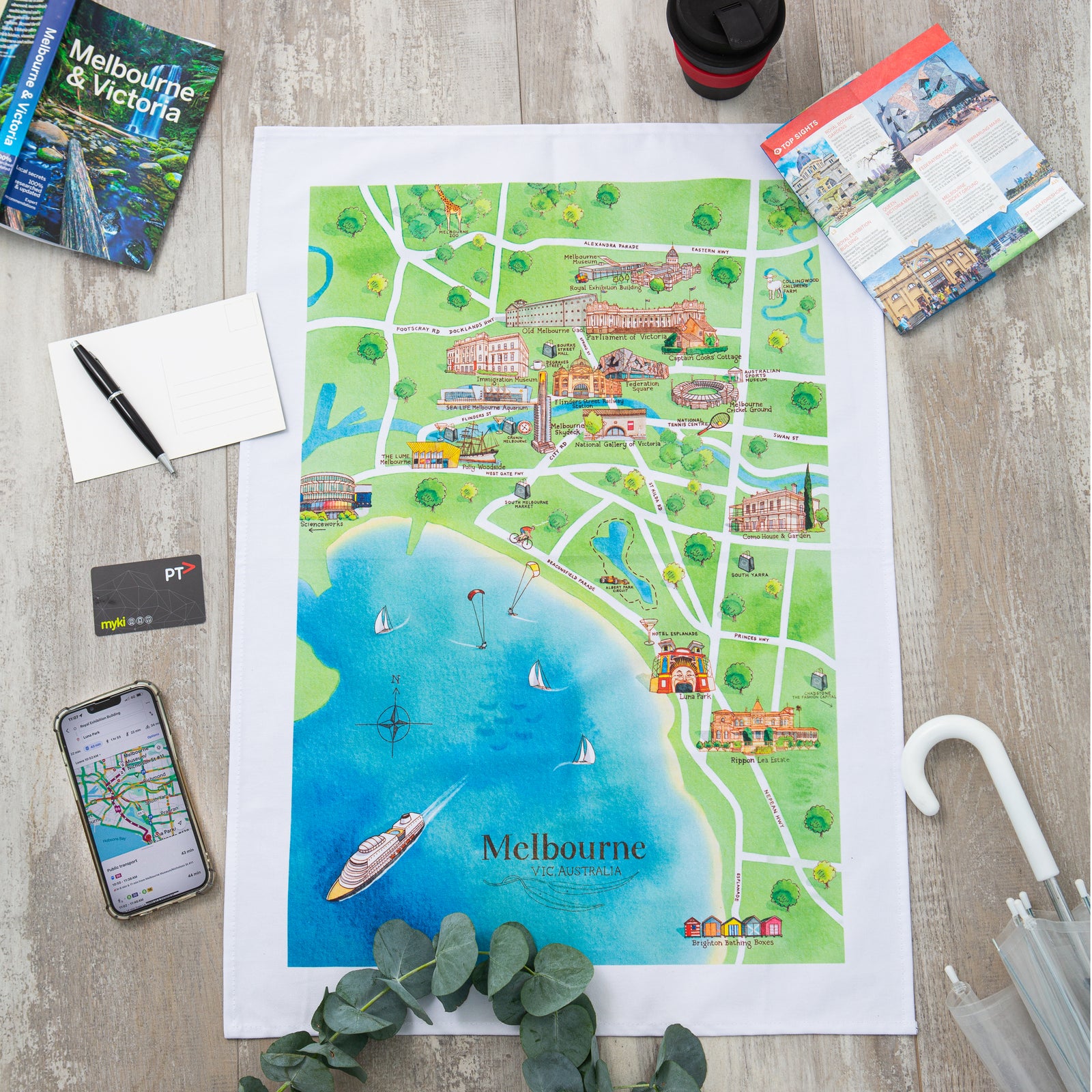 Melbourne tourist attractions map cotton tea towel styled on counter