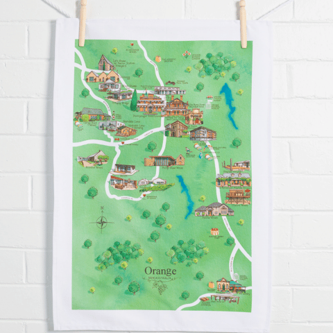 Orange wine region map tea towel suspended against wall