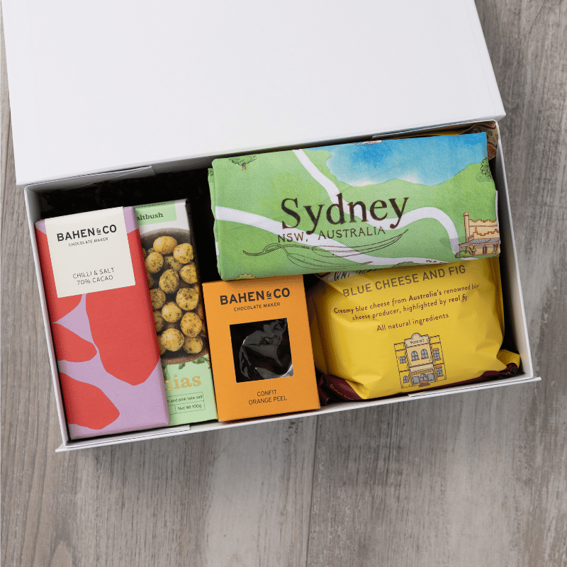 Gourmet popcorn, artisanal chocolate, hand-roasted macadamias, plus a watercolour-illustrated map cotton tea towel of Sydney and matching greeting card in a gift hamper with free delivery