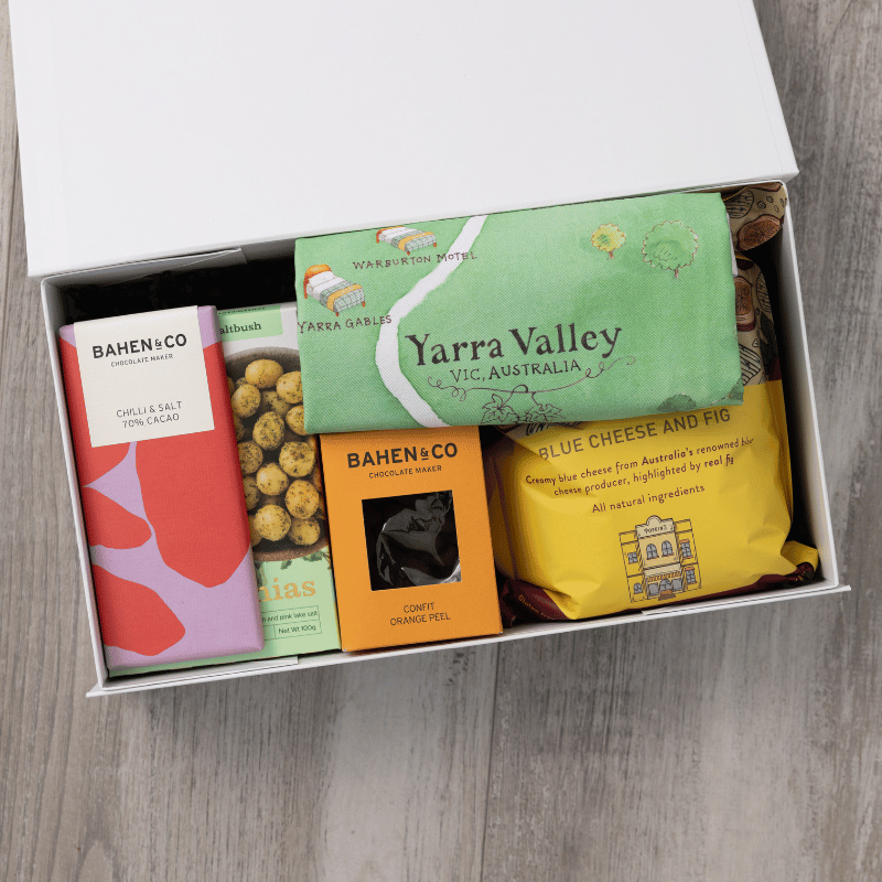 Gourmet popcorn, artisanal chocolate, hand-roasted macadamias, plus a watercolour-illustrated map cotton tea towel of the Yarra Valley and matching greeting card in a gift hamper with free delivery